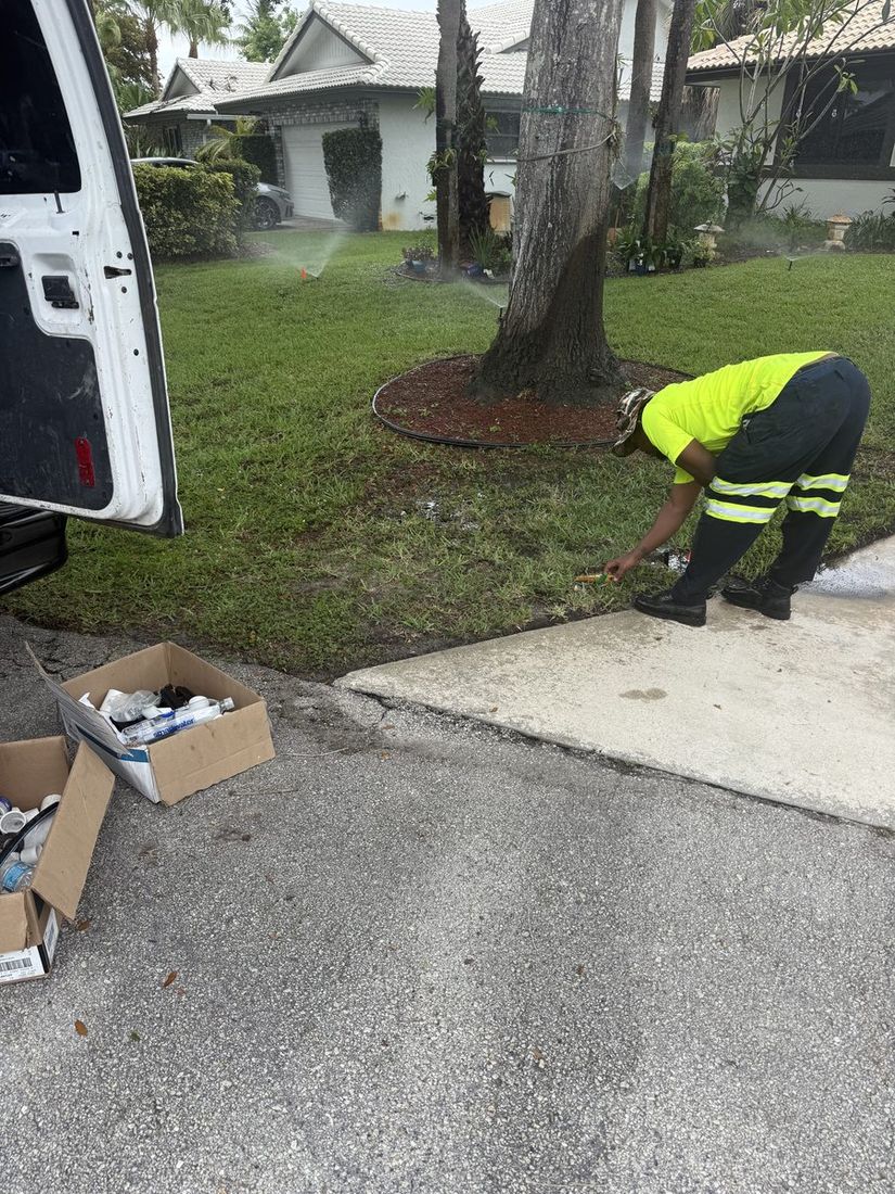 GroundLogic technician testing all irrigation zones after new well and system flush — Coral Springs, FL